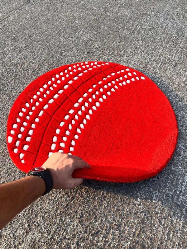 Red Cricket Ball By The Taj Rugs - Image 2