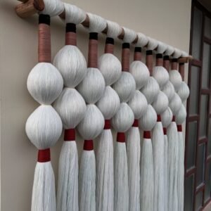 Luxury beaded macrame wall hanging with wooden rod in Udaipur